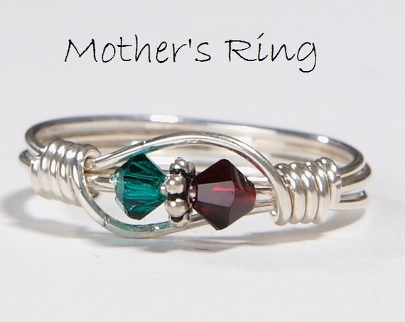 Claddagh ring with two birthstones deals