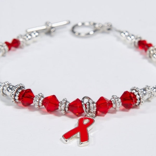 Red Ribbon Awareness Bracelet:Heart Disease,AIDS,HIV,RSD, Evans Syndrome, Tuberculosis, Von Willebrand's, Poland & Marfan Syndrome. Beaded.