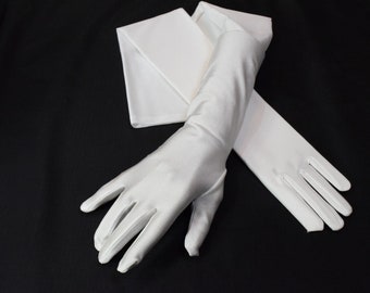 Light Ivory and Ivory Matte Satin Peau De Soie  Gloves 22" Opera Gloves 19" Above Elbo Gloves 15" Below Elbo Gloves 9" Wrist