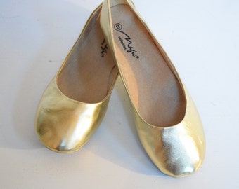 ladies gold ballet pumps