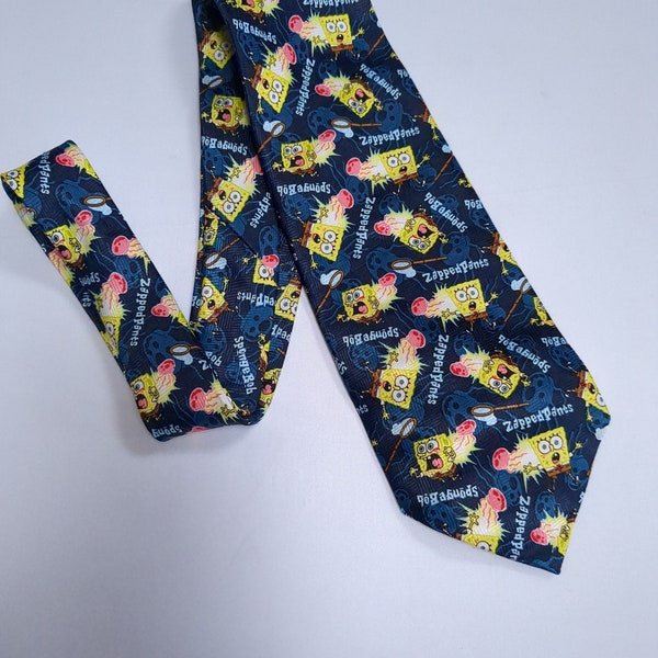 Sponge Bob Square Pants Necktie Who Lives In A Pineapple Under The Sea features Sponge Bob Getting Zapped Blue Tie with Yellow accents