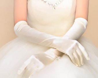 Light Ivory and Ivory Satin Gloves 22" Opera Gloves 19" Above Elbo Gloves 15" Below Elbo Gloves 14.5" Petite  Below Elbow 9" Wrist