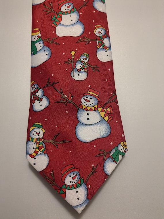 Snowmen Gather Around with an Array of Colorful S… - image 4