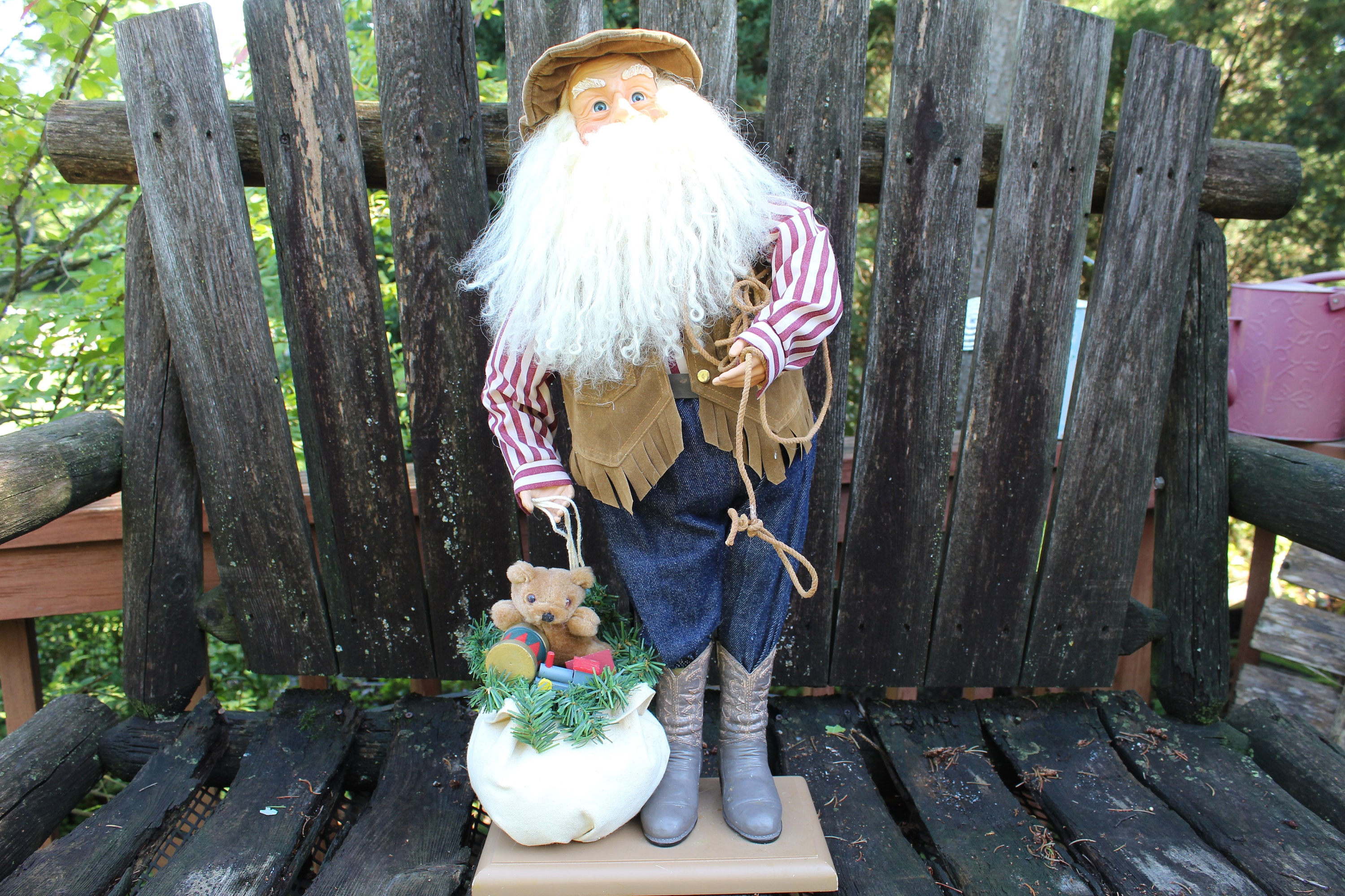 Western Cowboy Santa Claus 25" high Boots Holding saddle lasso kerchief wrapped gift in arms Soft white beard.