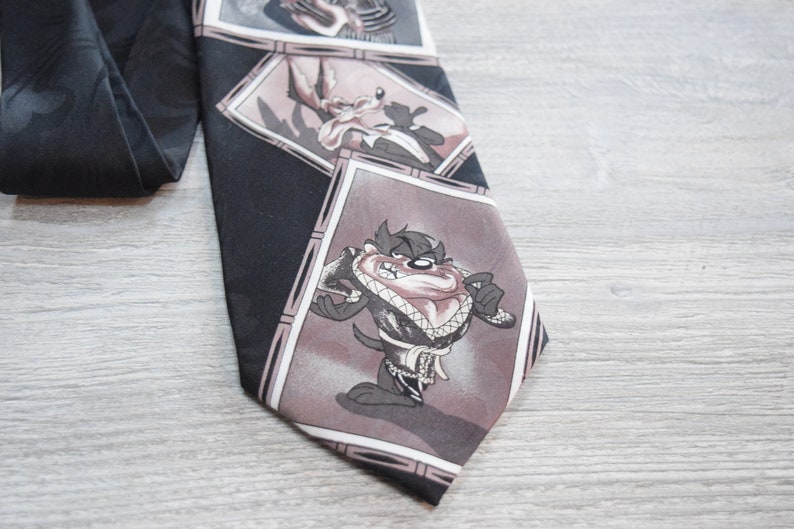 Looney Tunes Mania Black Necktie features Bugs Bunny Daffy Duck Tasmanian Devil in Comic Book Gangster Style