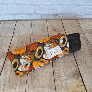 Eyeglass case: Quilted cotton, Fall print, snap closure.