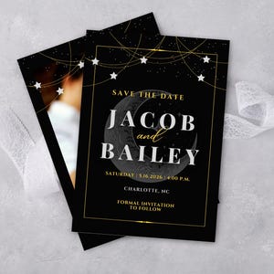 May include: Black wedding invitation with gold accents. The text reads "Save the Date" with the names "Jacob and Bailey" and the date and time of the wedding. The design includes stars and a crescent moon.