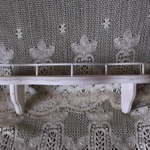 Shabby white wood wall shelf