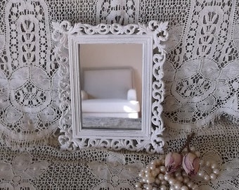 Shabby white metal small wall mirror berries and leaves