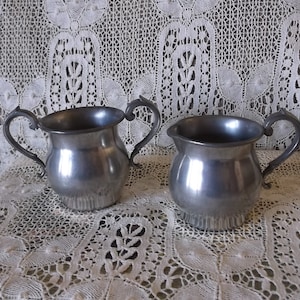 Vintage pewter creamer sugar set
