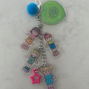 May include: A white ceramic mug with a black handle and the text "But First, Coffee" in a black, bold font. The mug is on a white surface. The mug is 4 inches tall.