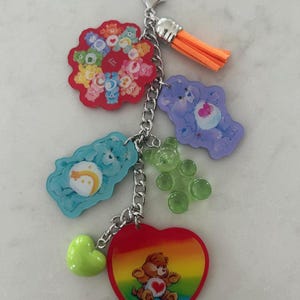 May include: A white ceramic mug with a black handle and the text "But first, coffee" in a handwritten style. The mug is on a white surface.