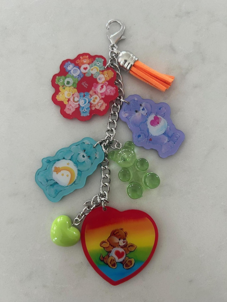 May include: A white ceramic mug with a black handle and the text "But first, coffee" in a handwritten style. The mug is on a white surface.