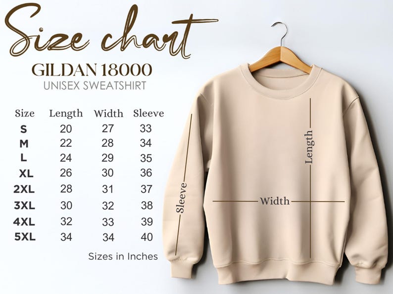 May include: A beige Gildan 18000 unisex sweatshirt hangs on a wooden hanger. The image includes a size chart with measurements in inches for sizes S to 5XL. The chart details length, width, and sleeve measurements.