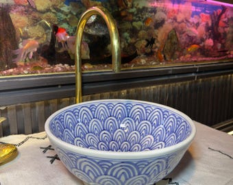 Moroccan washbasin sink, patterned and hand-painted in blue and white.