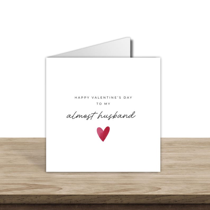 Minimalist greeting card printed on white 300gsm cardstock with text saying 'Happy Valentine's Day to My Almost Husband/Wife'.
Simple romantic design with multiple variations, with white envelope.