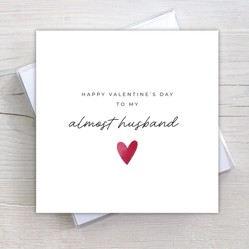 Minimalist greeting card printed on white 300gsm cardstock with text saying 'Happy Valentine's Day to My Almost Husband/Wife'.
Simple romantic design with multiple variations, with white envelope.