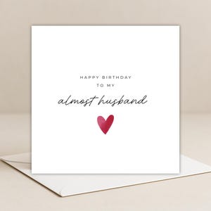 Minimalist greeting card printed on white 300gsm cardstock with text saying 'Happy Valentine's Day to My Almost Husband/Wife'.
Simple romantic design with multiple variations, with white envelope.