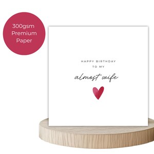 Minimalist greeting card printed on white 300gsm cardstock with text saying 'Happy Valentine's Day to My Almost Husband/Wife'.
Simple romantic design with multiple variations, with white envelope.