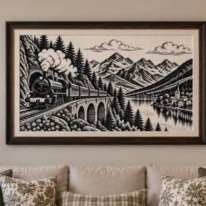 May include: A rectangular wall art piece featuring a black and white illustration of a steam locomotive traveling across a stone bridge. The scene includes dense pine forests, a calm lake, and jagged mountain peaks under a sky with clouds.