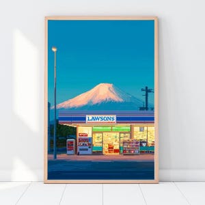 May include: A framed print featuring a Japanese convenience store, Lawson's, under a clear blue sky with a snow-capped mountain in the background. The store is lit up, and a street light stands in the foreground.