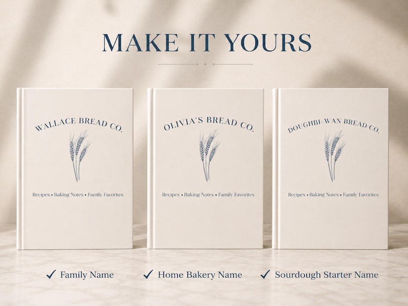 Puede incluir: Tres libros de tapa dura color blanco hueso con texto azul oscuro e ilustraciones de trigo. Las portadas presentan el texto MAKE IT YOURS en la parte superior, seguido de nombres personalizados como WALLACE BREAD CO., OLIVIA'S BREAD CO. y DOUGHBI-WAN BREAD CO.