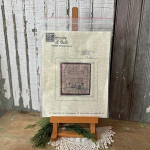 Reproduktion av korsstygn i vintagestil, från Threads of Gold