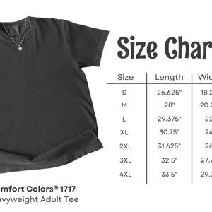 A dark gray t-shirt with a white size chart to its right, showing measurements for sizes S to 4XL.
