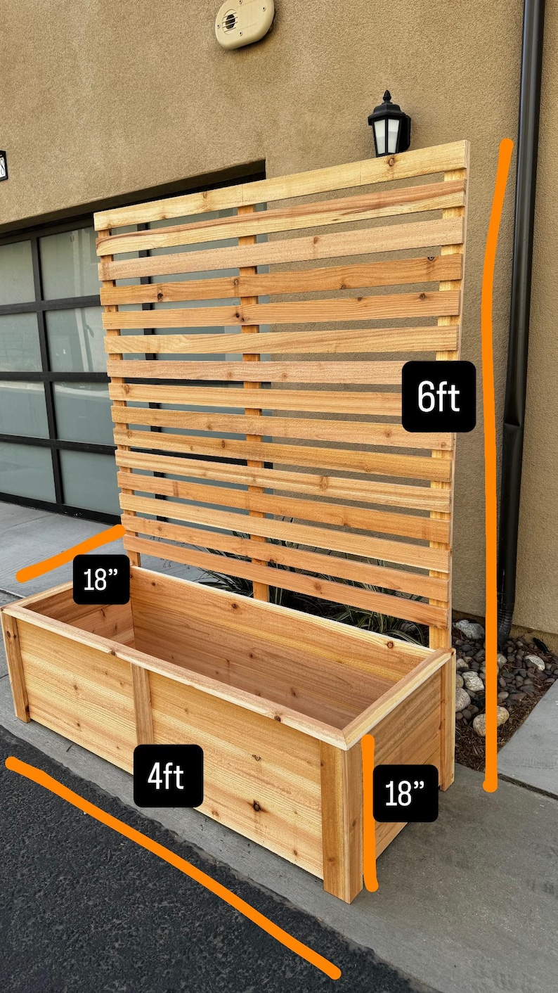 May include: A wooden planter box with a slatted trellis. The planter box is 4 feet long, 18 inches wide, and 18 inches tall. The trellis is 6 feet tall. The wood has a natural finish.