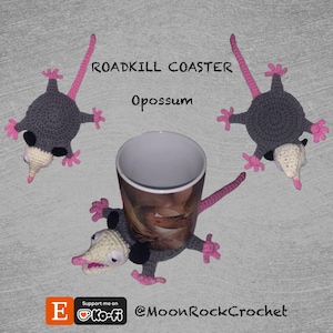 May include: Crocheted opossum coasters in gray, white, and pink, with the text "ROADKILL COASTER Opossum." The coasters are arranged around a white mug. The opossums have pink tails, feet, and noses. The mug has a photo on it.