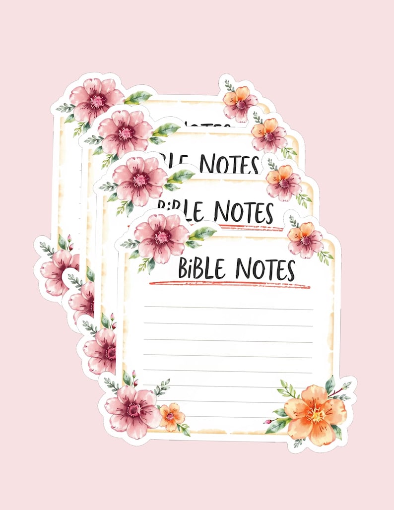 May include: A stack of floral-themed Bible Notes stickers. Each sticker features the words "Bible Notes" in black, with lined space for writing. The stickers are decorated with pink and orange flowers and green leaves, set against a light pink background.