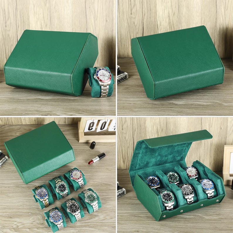 May include: A green watch box with a hinged lid, shown closed and open, revealing multiple watch compartments. Several wristwatches with silver bands and various watch faces are displayed inside the box. The box is made of a textured material.