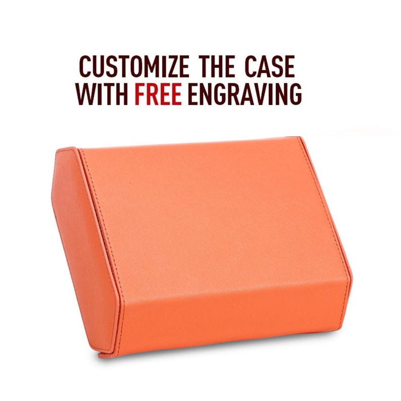 May include: An orange rectangular case with a stitched border. The text "CUSTOMIZE THE CASE WITH FREE ENGRAVING" is displayed above the case in dark brown and red text. The case is on a white background.