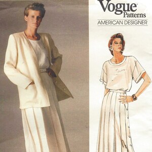 May include: Vogue Patterns American Designer sewing pattern for a white skirt and jacket. The skirt has a pleated front and a button closure. The jacket has a long, open front and a pocket on each side.