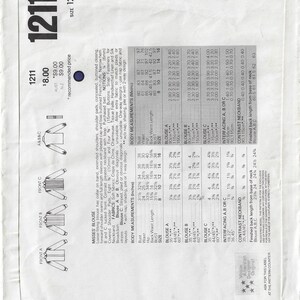 May include: A sewing pattern for a loose-fitting blouse with extended shoulders, shoulder pads, and full-length sleeves. The pattern includes instructions for a contrast pleated neckband and a buttoned closure. The pattern is for sizes 8-16.
