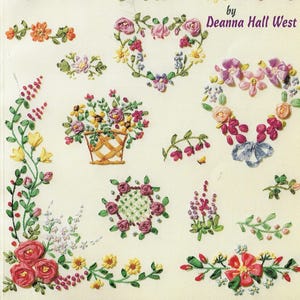 May include: A collection of colorful floral embroidery designs, including heart-shaped wreaths, floral baskets, and various flower arrangements. The designs feature pink, red, yellow, and purple flowers with green leaves, all set against a cream background. Text reads "by Deanna Hall West".