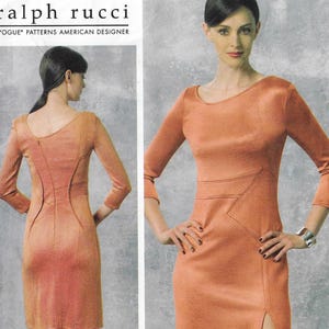 May include: A sewing pattern for a dress by Ralph Rucci. The pattern features a fitted, knee-length dress with a scoop neckline and three-quarter sleeves. The dress has a unique design with a diagonal seam on the front and a back panel with a curved seam.