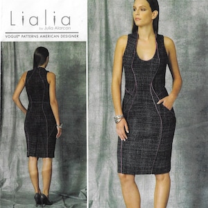 May include: A dark grey tweed dress with pink stitching detail, sleeveless and knee-length. The dress has a scoop neckline and pockets. The image also shows the Vogue Patterns American Designer logo.