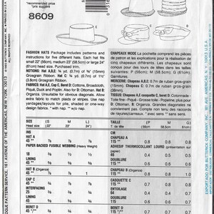 May include: A sewing pattern for five different hats, including a beret, a cap, and a sun hat. The pattern includes instructions for sizes small, medium, and large. The pattern is printed on a white background with blue text.