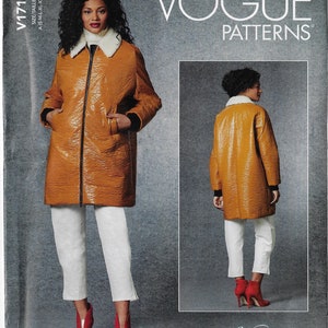 May include: A sewing pattern for a long, brown, faux leather coat with a white fur collar. The pattern is from Vogue Patterns and is called "Rachel Comey".