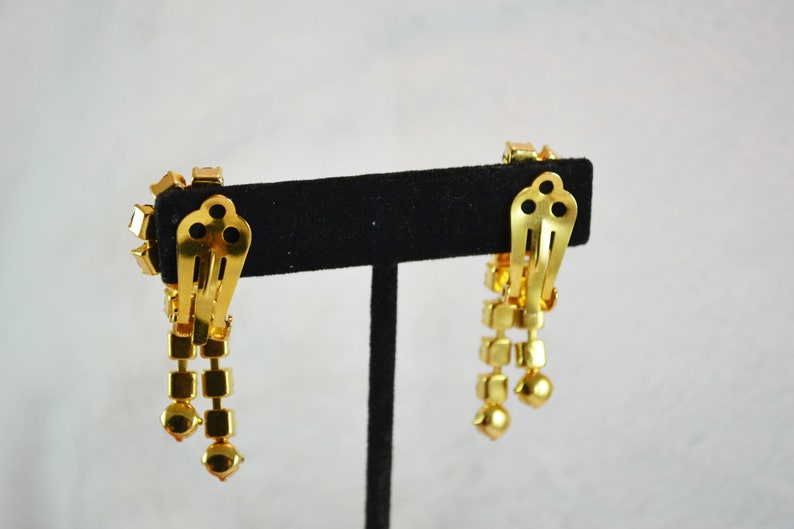 Prom or Special Occasion Bold Sparkling Rhinestone Clip On Earrings with Dangles Gold Tone Metal Great for Wedding
