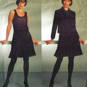 May include: A dark-colored sleeveless top and a matching knee-length skirt with a ruffled hem, paired with black tights and dark shoes. The outfit is also shown with a matching long-sleeved, collared jacket worn over the sleeveless top.