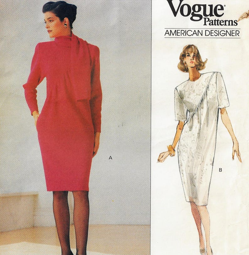 May include: Vogue Patterns American Designer sewing pattern for a dress with two styles. Style A is a red dress with a high neck and a long sleeve. Style B is a white dress with a round neck and a short sleeve. The pattern is for sizes 6-14.