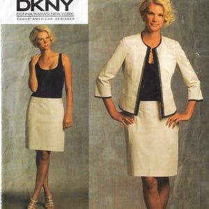 May include: A DKNY Vogue American Designer pattern featuring a cream-colored skirt suit with black trim. The suit includes a jacket and a knee-length skirt. The model is wearing a black tank top. The DKNY logo is visible at the top.