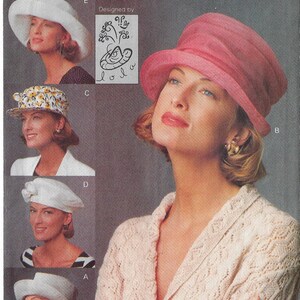 May include: Vogue Accessories pattern 8609 for a hat. The pattern includes five different hat styles: a wide-brimmed sun hat, a floppy hat, a small hat with a bow, a beret, and a cloche hat. The pattern is designed by Lola.