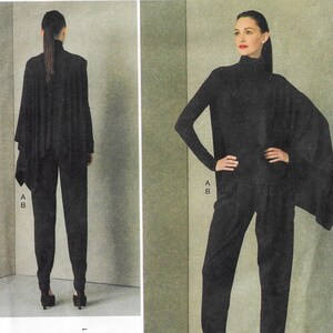 May include: A black ensemble consisting of a long-sleeved mock neck top with an asymmetrical draped panel on one side and matching slim-fit trousers. The outfit is shown from both the front and back views, featuring the letters A and B.
