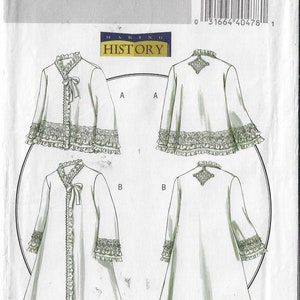 May include: A sewing pattern for a white, long-sleeved robe with lace trim. The pattern is for sizes 14-16-18-20 and is from Butterick, Making History. The pattern includes two different styles, one with a tie at the neck and one with a decorative detail on the back.