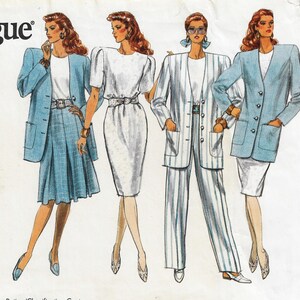 May include: A vintage sewing pattern featuring four different outfit designs. The outfits are all in shades of blue and white, with a variety of styles, including a skirt and jacket, a dress, and a pantsuit. The pattern is from Vogue.