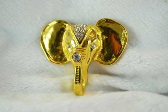 Bouton Coco Chanel Paris vintage 22 mm modèle éléphant en métal doré