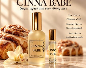 May include: LuvBev Fragrances Cinna Babe eau de parfum oil in a frosted glass spray bottle and a small rollerball bottle. Labels feature the text Cinna Babe, Sugar, Spice and everything nice, and a list of notes including cinnamon, cassis, clove, sugar, maple, vanilla glaze, and amber.